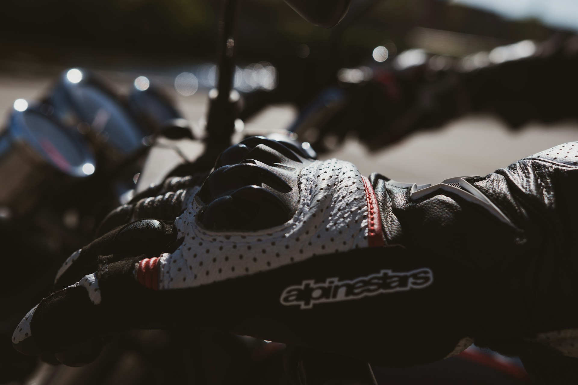 Breathable knit riding shoes and short gloves with textile inserts are now common